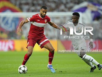 Josha Vagnoman right-back of Stuttgart and Germany and Vinicius Junior left winger of Real Madrid and Brazil compete for the ball during the...