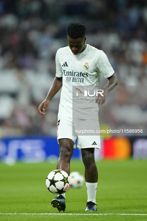 Vinicius Junior left winger of Real Madrid and Brazil during the warm-up before the UEFA Champions League 2024/25 League Phase MD1 match bet...