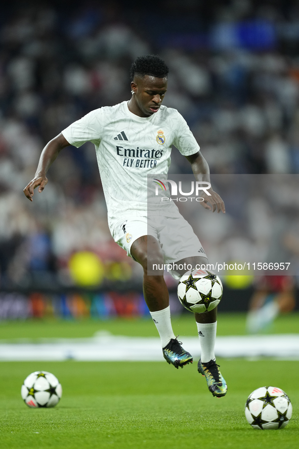 Vinicius Junior left winger of Real Madrid and Brazil  during the warm-up before the UEFA Champions League 2024/25 League Phase MD1 match be...