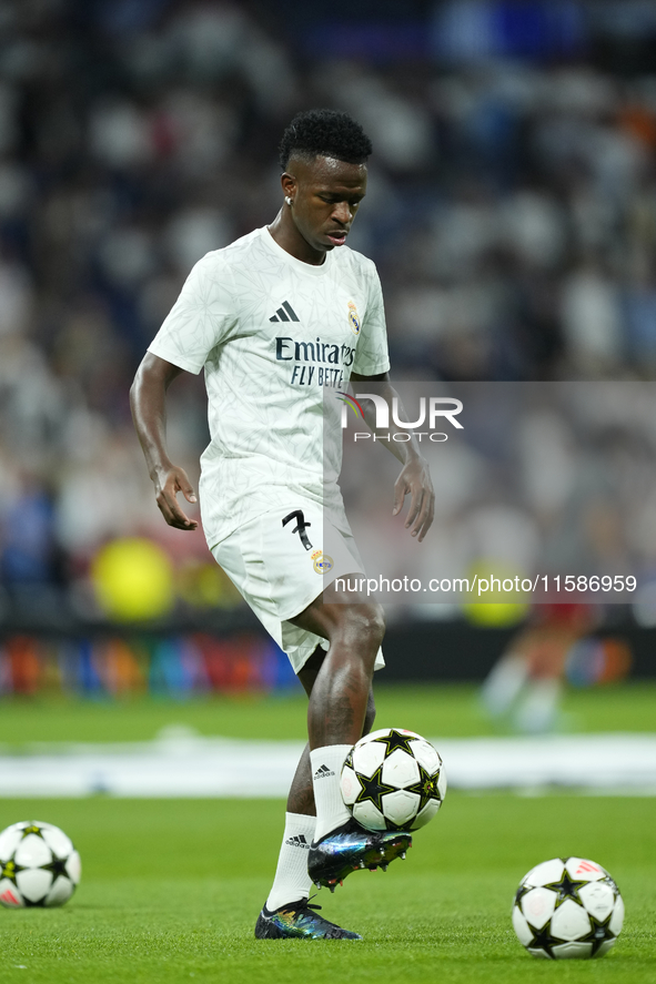 Vinicius Junior left winger of Real Madrid and Brazil  during the warm-up before the UEFA Champions League 2024/25 League Phase MD1 match be...