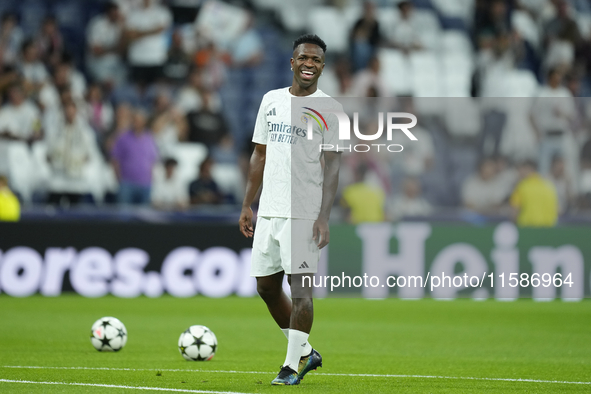 Vinicius Junior left winger of Real Madrid and Brazil  during the warm-up before the UEFA Champions League 2024/25 League Phase MD1 match be...