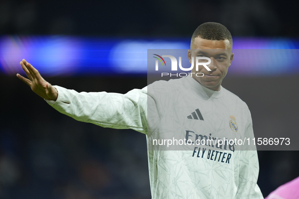 Kylian Mbappe centre-forward of Real Madrid and France during the warm-up before the UEFA Champions League 2024/25 League Phase MD1 match be...