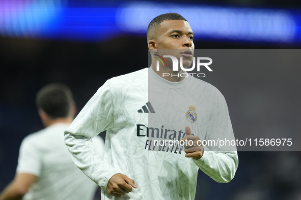 Kylian Mbappe centre-forward of Real Madrid and France during the warm-up before the UEFA Champions League 2024/25 League Phase MD1 match be...