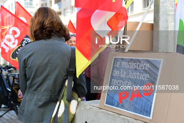 Several CGT demonstrators in front of the Lyon court protest against the elimination of posts in the youth judicial police in Lyon, France,...