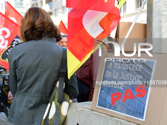 Several CGT demonstrators in front of the Lyon court protest against the elimination of posts in the youth judicial police in Lyon, France,...