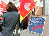 Several CGT demonstrators in front of the Lyon court protest against the elimination of posts in the youth judicial police in Lyon, France,...