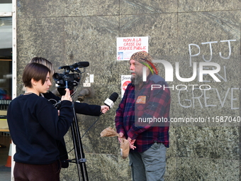 Several CGT demonstrators in front of the Lyon court protest against the elimination of posts in the youth judicial police in Lyon, France,...