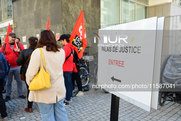 Several CGT demonstrators in front of the Lyon court protest against the elimination of posts in the youth judicial police in Lyon, France,...