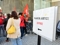 Several CGT demonstrators in front of the Lyon court protest against the elimination of posts in the youth judicial police in Lyon, France,...