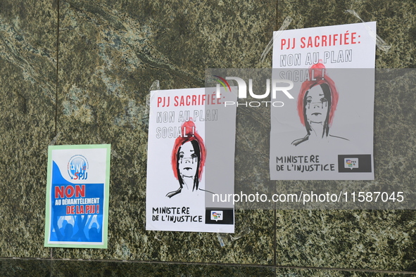 Several CGT demonstrators in front of the Lyon court protest against the elimination of posts in the youth judicial police in Lyon, France,...