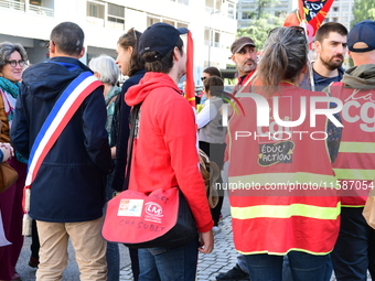 Several CGT demonstrators in front of the Lyon court protest against the elimination of posts in the youth judicial police in Lyon, France,...