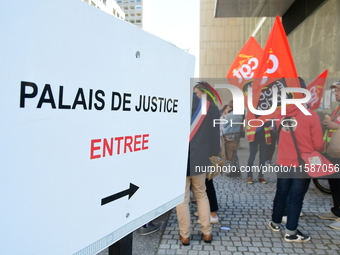 Several CGT demonstrators in front of the Lyon court protest against the elimination of posts in the youth judicial police in Lyon, France,...