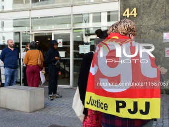 Several CGT demonstrators in front of the Lyon court protest against the elimination of posts in the youth judicial police in Lyon, France,...