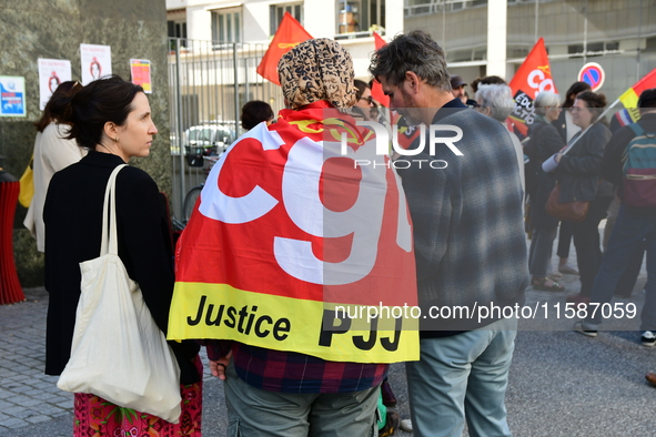 Several CGT demonstrators in front of the Lyon court protest against the elimination of posts in the youth judicial police in Lyon, France,...