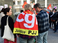 Several CGT demonstrators in front of the Lyon court protest against the elimination of posts in the youth judicial police in Lyon, France,...