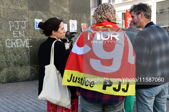 Several CGT demonstrators in front of the Lyon court protest against the elimination of posts in the youth judicial police in Lyon, France,...