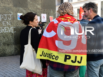 Several CGT demonstrators in front of the Lyon court protest against the elimination of posts in the youth judicial police in Lyon, France,...