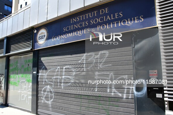 Several tags appear on the Institute of Social, Economic and Political Sciences, Marion Marechal's school, against the arrival of Marguerite...