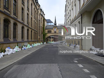 Sandbags lie against buildings during high water levels in the Oder River in Wroclaw, Poland, on September 19, 2024. (