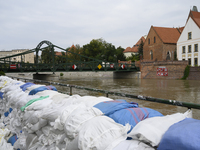 Sandbags sit against the river banks during high waters in the Oder River in Wroclaw, Poland, on September 19, 2024. (