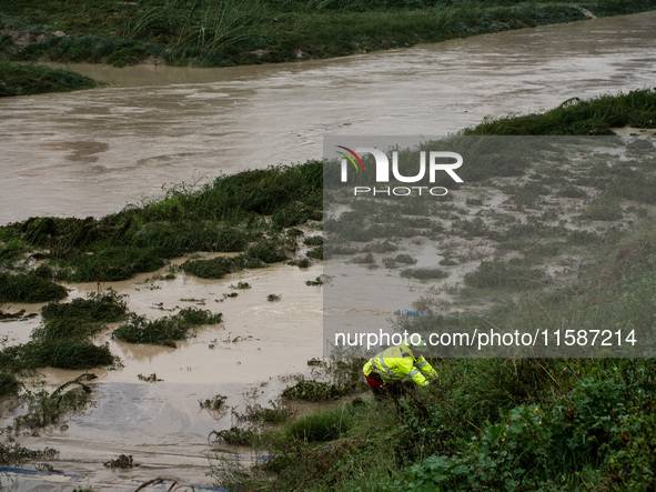 Civil protection operates along the Lamone River during the flood in Faenza, Emilia-Romagna, on September 19, 2024. 