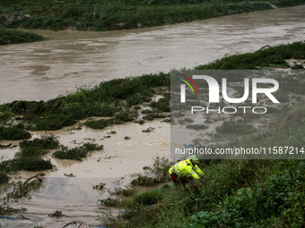 Civil protection operates along the Lamone River during the flood in Faenza, Emilia-Romagna, on September 19, 2024. (