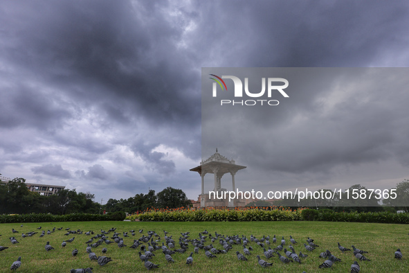 Dark clouds hover over Statue Circle during the monsoon season in Jaipur, Rajasthan, India, on September 19, 2024. 