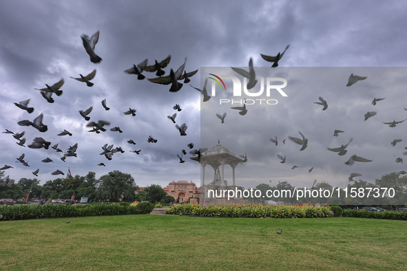 Dark clouds hover over Statue Circle during the monsoon season in Jaipur, Rajasthan, India, on September 19, 2024. 