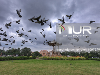 Dark clouds hover over Statue Circle during the monsoon season in Jaipur, Rajasthan, India, on September 19, 2024. (