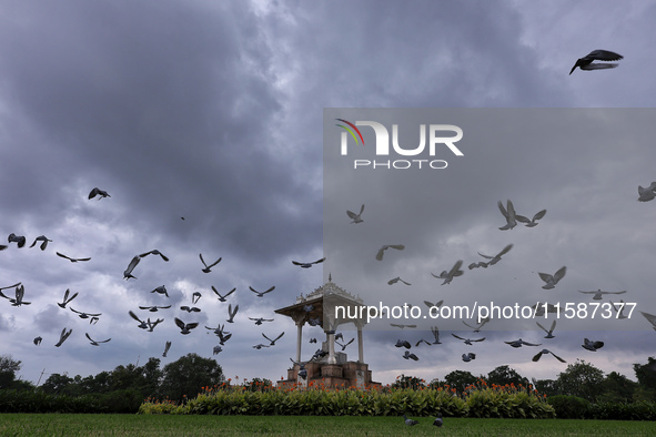 Dark clouds hover over Statue Circle during the monsoon season in Jaipur, Rajasthan, India, on September 19, 2024. 