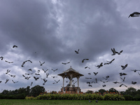 Dark clouds hover over Statue Circle during the monsoon season in Jaipur, Rajasthan, India, on September 19, 2024. (