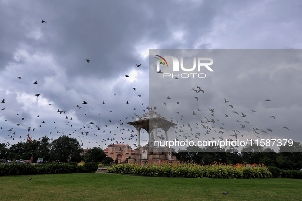 Dark clouds hover over Statue Circle during the monsoon season in Jaipur, Rajasthan, India, on September 19, 2024. 