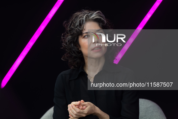 Meredith Whittaker, Co-Founder of AI Now Institute Signal, speaks at Media Park on the second day of Deutsche Telekom's Digital X event in C...