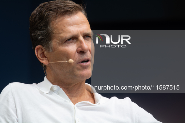 Oliver Bierhoff, Chairman and Co-Founder of FINVIA Sports GmbH, speaks at Stadtgarten on the second day of Deutsche Telekom's Digital X even...