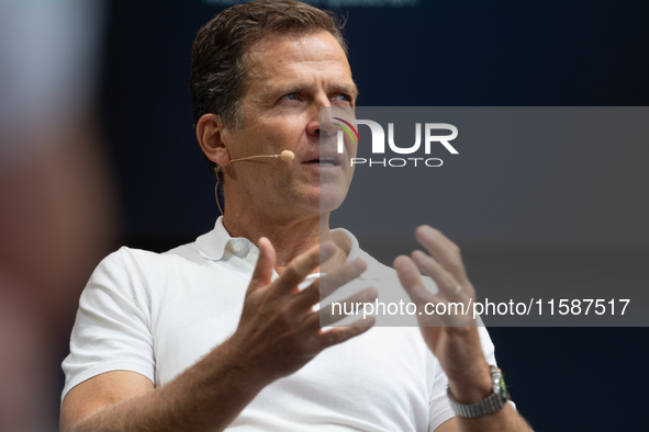 Oliver Bierhoff, Chairman and Co-Founder of FINVIA Sports GmbH, speaks at Stadtgarten on the second day of Deutsche Telekom's Digital X even...