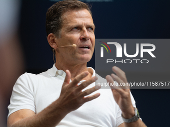 Oliver Bierhoff, Chairman and Co-Founder of FINVIA Sports GmbH, speaks at Stadtgarten on the second day of Deutsche Telekom's Digital X even...