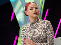 Badmomzjay, a German rapper, speaks at Media Park on the second day of Deutsche Telekom's Digital X event in Cologne, Germany, on September...