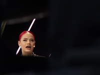 Badmomzjay, a German rapper, speaks at Media Park on the second day of Deutsche Telekom's Digital X event in Cologne, Germany, on September...