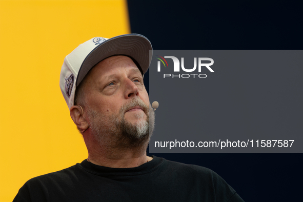 Smudo, a German musician, speaks at Media Park on the second day of Deutsche Telekom's Digital X event in Cologne, Germany, on September 18,...