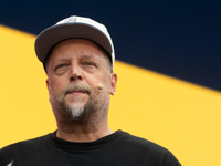 Smudo, a German musician, speaks at Media Park on the second day of Deutsche Telekom's Digital X event in Cologne, Germany, on September 18,...