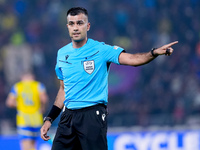 Referee Rohit Soggi gestures during the UEFA Champions League 2024/25 League Phase MD1 match between Bologna FC and FC Shakhtar Donetsk at S...