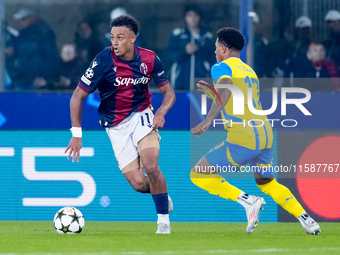 Dan Ndoye of Bologna FC and Vinicius Tobias of FC Shakhtar Donetsk compete for the ball during the UEFA Champions League 2024/25 League Phas...