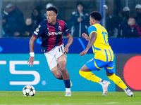 Dan Ndoye of Bologna FC and Vinicius Tobias of FC Shakhtar Donetsk compete for the ball during the UEFA Champions League 2024/25 League Phas...