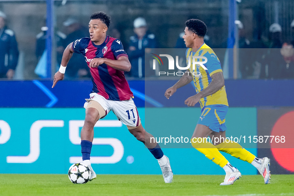 Dan Ndoye of Bologna FC and Vinicius Tobias of FC Shakhtar Donetsk during the UEFA Champions League 2024/25 League Phase MD1 match between B...