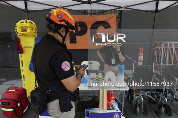 The civil protection team participates on September 19, 2024, during the National Drill 2024 in the Zocalo of Mexico City, Mexico, and sever...