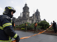 Members of the Heroic Fire Brigade participate in the National Drill 2024 in Mexico City, Mexico, on September 19, 2024, to evaluate and cor...