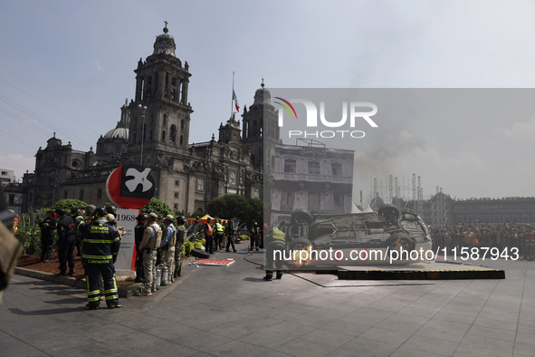 Members of the Heroic Fire Brigade participate in the National Drill 2024 in Mexico City, Mexico, on September 19, 2024, to evaluate and cor...