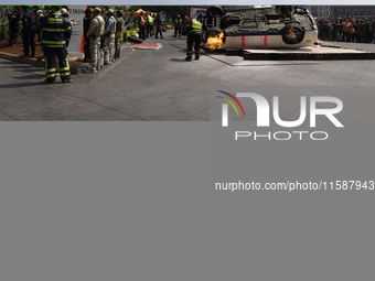 Members of the Heroic Fire Brigade participate in the National Drill 2024 in Mexico City, Mexico, on September 19, 2024, to evaluate and cor...