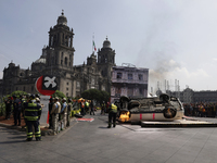 Members of the Heroic Fire Brigade participate in the National Drill 2024 in Mexico City, Mexico, on September 19, 2024, to evaluate and cor...