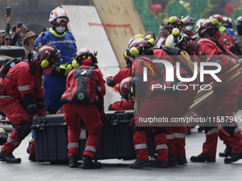 Members of the Secretary of the Navy participate in the National Drill 2024 in the Zocalo of Mexico City, Mexico, on September 19, 2024, to...